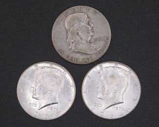 Lot 230. Two 1964 Kennedy and one Franklin Half Dollars
