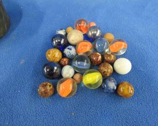 Lot 65. Marbles including vintage clay and glass shooters in an ornamental metallic basket