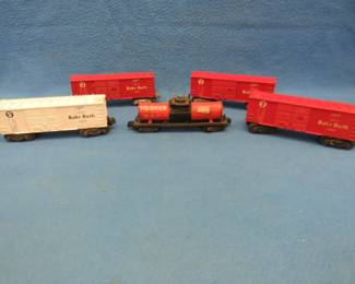 Lot 176. Four Lionel cars and one Gilbert