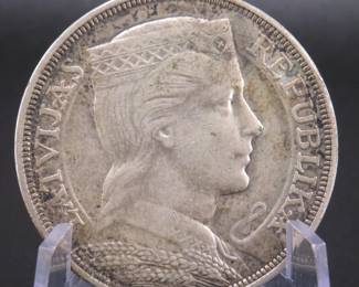 Lot 85. One 5 Lats Latvian .835 silver coin weighing 24.95 grams