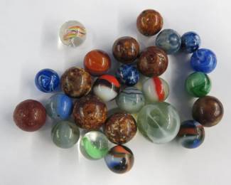 Lot 369. Vintage marbles including some clays and one swirl