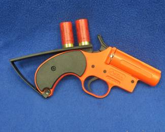 Lot 360. Olin flare gun with two flares