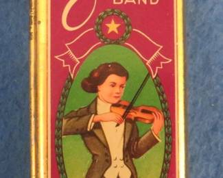 Lot 107. Vintage new-in-the-box F.A. Bohm Violin King harmonica and hinged tin box