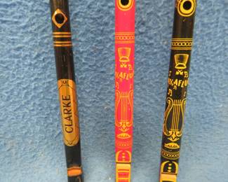 Lot 202. Three metal 1950's tin litho toy Clarke Saxaflutes