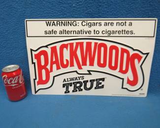 Lot 291. Backwoods metal sign. 17" x 11".