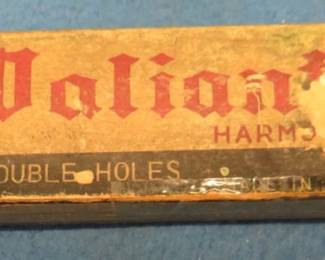 Lot 154. Unknown Japan maker vintage Valiant 12-hole tremolo harmonica and box in VGC. Sounds great