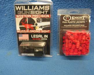 Lot 303. Williams WGRS Western inline ML set muzzleloader sight and 100 Knight full plastic jackets for 209 primers. Both are new in the package.