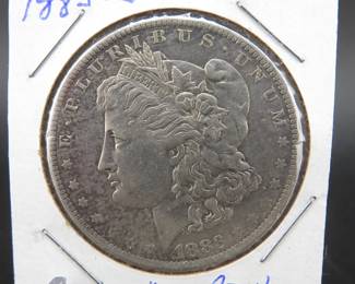 Lot 348. 1883 O Morgan silver dollar