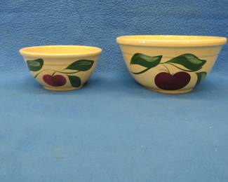 Lot 91. Two Watt Ware apple pattern bowls with advertising. A 7" from Hilltop Farm Feed Mill and a 9" from Arthur N. Dakota. Both in very good condition.