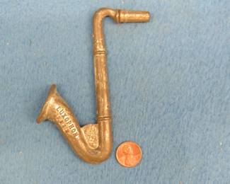 Lot 105. Vintage toy D.R.G.M. tin penny Luxophone. Works