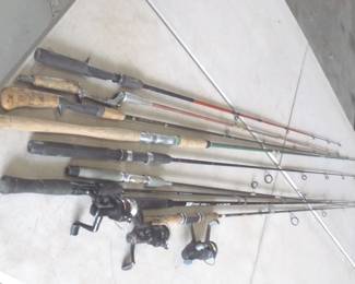 Lot 394. They're biting! Nine rods and three reels. Check photos for tips
