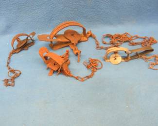 Lot 247. Four Victor traps