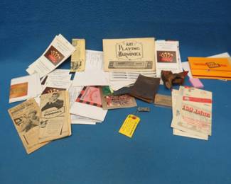 Lot 49. Harmonica related ephemera and a miniature Lucky harmonica