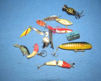 Lot 166. Grab bag of lures plus a joke: What is the Pope's favorite fish? Holy mackerel, of course.