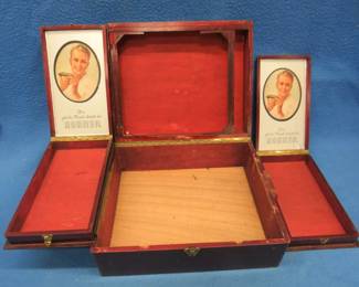 Lot 101. Vintage wooden Hohner harmonica counter display box labeled Hohner Die Weltmarke (World Brand) with two hinged trays that fold out to the side. One side needs to be reattached. 13"w x 5 1/2" x 10 3/4'D. Nice graphic pictures in the trays. Minimum bid $20