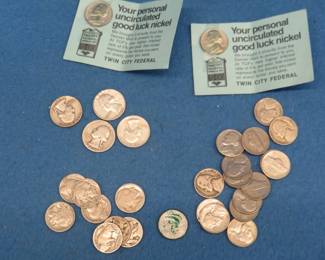 Lot 36. Four Silver Washington Quarters, 9 Buffalo Nickels, and 17 Jefferson Nickels