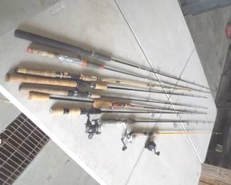 Lot 391. They're biting! Nine rods and three reels. Check photos for tips