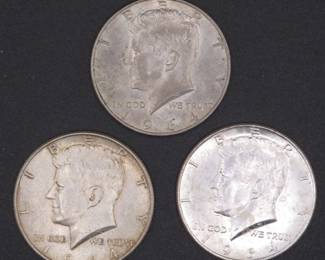 Lot 134. Three 1964 Kennedy Half Dollars that came to us in an unopened bank roll
