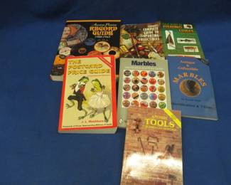 Lot 210. Price and information guides on multiple collectibles