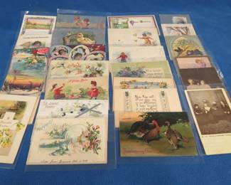 Lot 42. Mid-century postcards in plastic sleeves