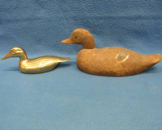 Lot 13. Two collectible ducks. Machine-carved hen mallard with glass eyes (one is damaged) and a brass decorative duck.