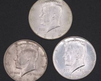 Lot 133. Three 1964 Kennedy Half Dollars that came to us in an unopened bank roll