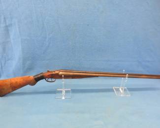 Lot 403. Stevens 12-gauge double barrel shotgun. S/N 2108. Usability unknown.