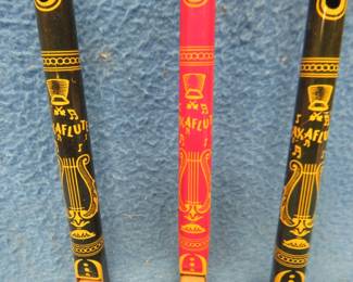 Lot 203. Three metal 1950's tin litho toy Clarke Saxaflutes
