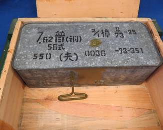 Lot 384. 550 7.62 x 39 Chinese rounds in an unopened spam can with key and a wooden crate