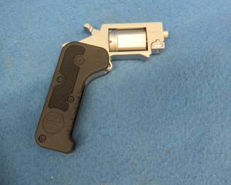 Lot 64. .22 magnum switch gun in original box. S/N GG002302. Permit required.