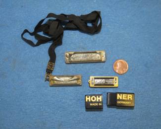 Lot 255. Three old mini charm harmonicas that all sound great: F.A. Rauner My Little One. In this auction's 'Auctioneer's Notes,' we list John Whitman's Harmonica Anthology 11th Ed. April 25, 2019 as a free and easy source to get more information about specific harmonicas. The harmonica in this lot or one like it can be found at page 422. C.A. Seydel Little Bandmaster. Hohner 1200 Jahre Trossingen.