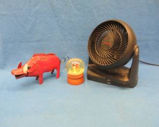 Lot 216. Honeywell oscillating fan, snow globe, and an Arkansas Razorback pig metal pig