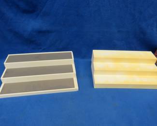 Lot 220. Two adjustable-width tiered display stands