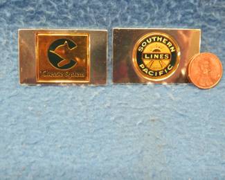 Lot 311. Two sterling silver ingots from "The Great American Railroad Emblems" series. The Southern Pacific Lines and the Chessie System. Total weight 46.67 grams.