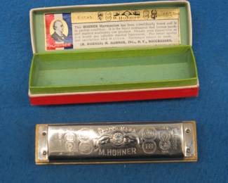 Lot 50. M. Hohner's Old standby 10-hole diatonic 440 harmonica in the key of C. Harmonica and box are in excellent condition. In this auction's 'Auctioneer's Notes,' we list John Whitman's Harmonica Anthology 11th Ed. April 25, 2019 as a free and easy source to get more information about specific harmonicas. The harmonica in this lot or one like it can be found at page 219.