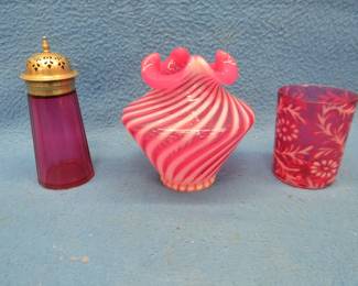 Lot 221. Cranberry glass collection: Tumbler. Ruffled top vase. Shaker with a non-matching top.