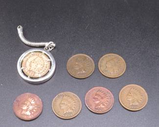 Lot 84. Seven Indian Head Pennies: 1896, 1898, 1899 (2), 1902 (2), and 1903