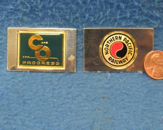 Lot 310. Two sterling silver ingots from "The Great American Railroad Emblems" series. The Northern Pacific and the C & O Progress. Total weight 46.53 grams.