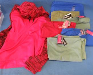 Lot 334. New clothing with tags: Four St John's Bay pocket tee shirts Size XLT. Two St. John' Bay pocket tee shirts size LT. Nike Dri-Fit pull over sweatshirt size XLT.