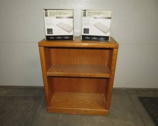 Lot 297. Cabinet with an adjustable shelf 24" x 10" x 29" and two cushion covers.