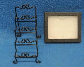 Lot 59. Four-place harmonica display rack and a windowed 5 1/2" x 4 1/2" display box
