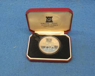 Lot 293. 1975 Isle of Man 25 pence sterling silver coin. 28.66 grams.