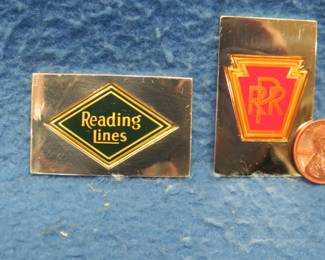 Lot 320. Two sterling silver ingots from "The Great American Railroad Emblems" series. The Reading and the Pennsylvania. Total weight 46.46 grams.