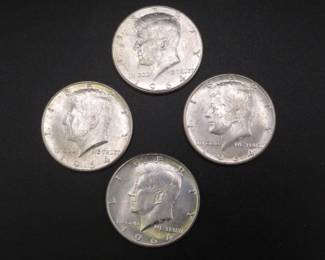 Lot 122. Four High Grade 1964 P Kennedy Half Dollars