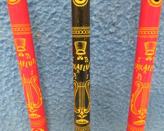 Lot 201. Three metal 1950's tin litho toy Clarke Saxaflutes