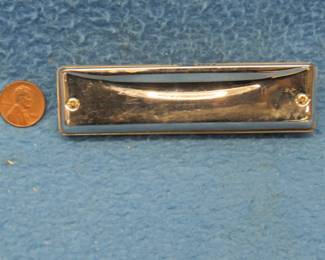Lot 158. Suzuki 10-hole diatonic harmonica in the key of F. Sounds great.