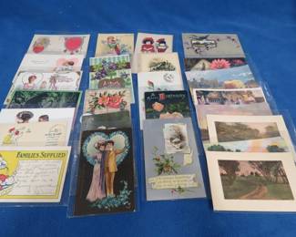 Lot 47. Mid-century postcards in plastic sleeves