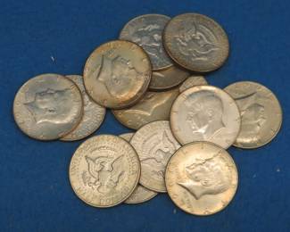 Lot 32. Fourteen 40% Silver Kennedy Half Dollars