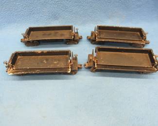 Lot 175. Four Lionel automatic dump cars