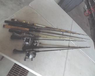 Lot 395. They're biting! Nine rods and three reels. Check photos for tips
